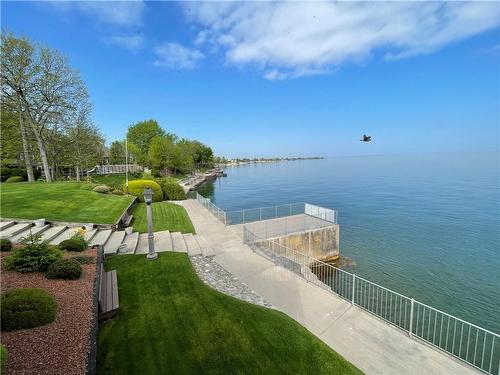 Nestled between both Newport Yacht Club and Fifty Point Marina, the boater will LOVE having the sailboat or cruiser so close by. - 23 Winona Park Road, Stoney Creek, ON - Outdoor With Body Of Water With View