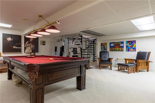 It's all fun and games from the lower level rec room! Let teens retreat downstairs our of the main upper level spaces or display memorabilia from your favourite sports teams creating the ultimate - 23 Winona Park Road, Stoney Creek, ON - Indoor Photo Showing Other Room