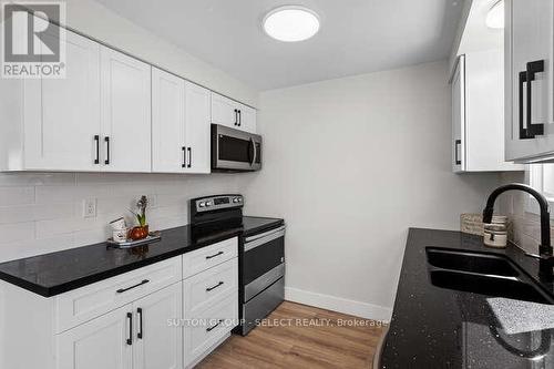 54 - 40 Tiffany Drive, London, ON - Indoor Photo Showing Kitchen With Double Sink