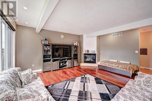 89 Finch Avenue, Woodstock, ON - Indoor Photo Showing Living Room With Fireplace