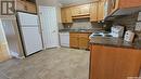 113 503 Colonel Otter Drive, Swift Current, SK  - Indoor Photo Showing Kitchen With Double Sink 