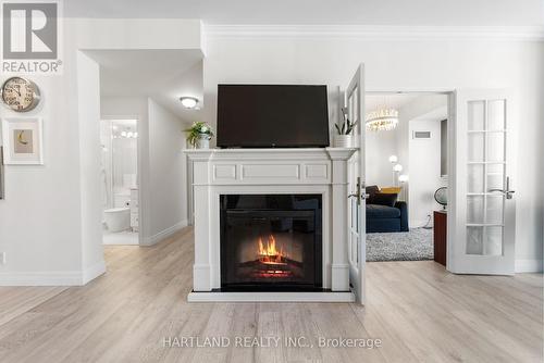 2601 - 70 Absolute Avenue, Mississauga, ON - Indoor Photo Showing Living Room With Fireplace