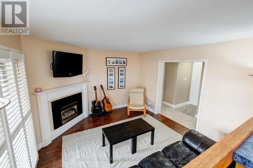 1832 Bronte Square, Pickering, ON - Indoor Photo Showing Living Room With Fireplace