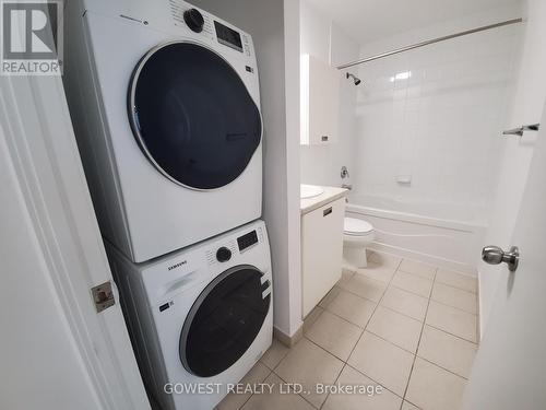 2110 - 38 Grenville Street, Toronto, ON - Indoor Photo Showing Laundry Room