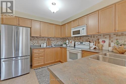 27 Tracey Court, Whitby, ON - Indoor Photo Showing Kitchen With Double Sink