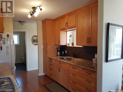 325 Ruby Drive, Hitchcock Bay, SK - Indoor Photo Showing Kitchen With Double Sink