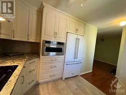 Updated kitchen with granite countertops - 