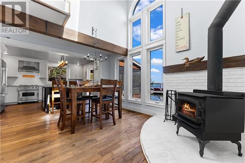 60 Pinehaven Lane, Perth Road, ON - Indoor Photo Showing Dining Room With Fireplace