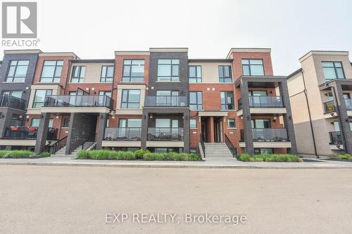 40 - 100 Dufay Road, Brampton, ON - Outdoor With Balcony With Facade