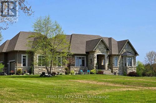 705 Lake Ridge Road S, Whitby, ON - Outdoor With Facade