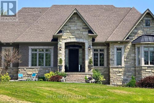705 Lake Ridge Road S, Whitby, ON - Outdoor With Facade