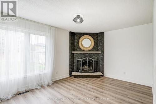 57 Largo Cres, Vaughan, ON - Indoor Photo Showing Living Room With Fireplace
