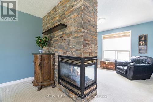 36 Marlow Circle, Springwater, ON - Indoor With Fireplace