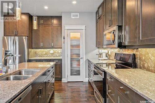 582 Atton Lane, Saskatoon, SK - Indoor Photo Showing Kitchen With Double Sink With Upgraded Kitchen