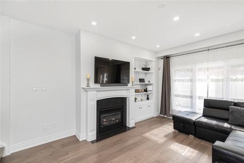 227 Penny Lane, Stoney Creek, ON - Indoor Photo Showing Living Room With Fireplace
