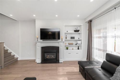 227 Penny Lane, Stoney Creek, ON - Indoor Photo Showing Living Room With Fireplace