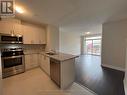 #208 -5917 Main St, Whitchurch-Stouffville, ON  - Indoor Photo Showing Kitchen With Double Sink 