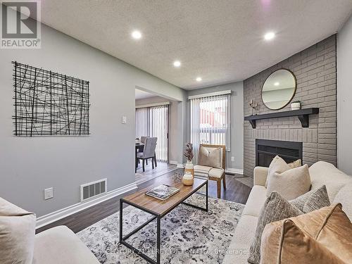 12 Keeble Crescent, Ajax, ON - Indoor Photo Showing Living Room With Fireplace
