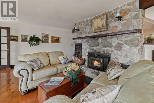 32C Windatt Lane, Prince Edward County, ON - Indoor Photo Showing Living Room With Fireplace