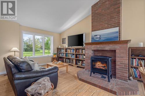 305 Massassauga Road, Prince Edward County, ON - Indoor Photo Showing Living Room With Fireplace
