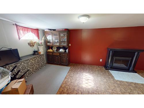 77 Little Van Horne Street S, Cranbrook, BC - Indoor With Fireplace