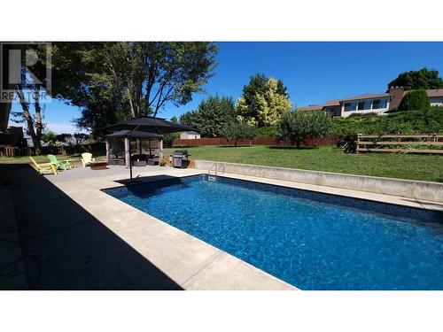 45 Fairmont Place, Coldstream, BC - Outdoor With In Ground Pool With Backyard