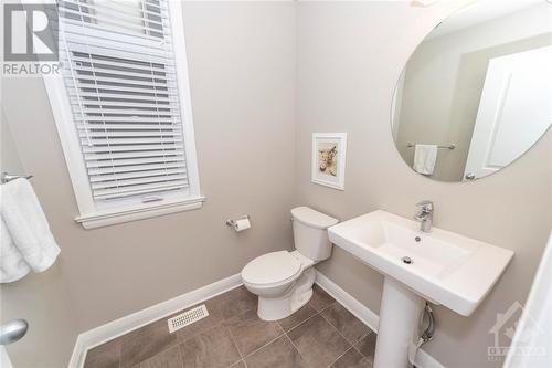 A main floor powder room - 268 Huntsville Drive, Ottawa, ON - Indoor Photo Showing Bathroom