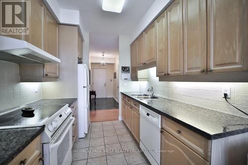 509 - 2 Aberfoyle Crescent, Toronto, ON - Indoor Photo Showing Kitchen With Double Sink