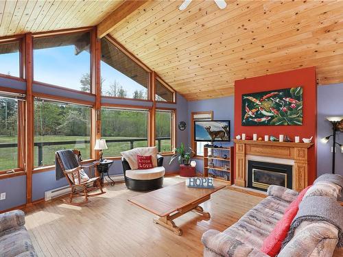 3494 Macaulay Rd, Black Creek, BC - Indoor Photo Showing Living Room With Fireplace
