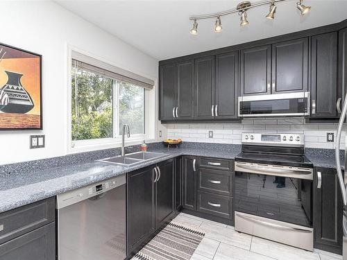 303-1361 Hillside Ave, Victoria, BC - Indoor Photo Showing Kitchen With Double Sink