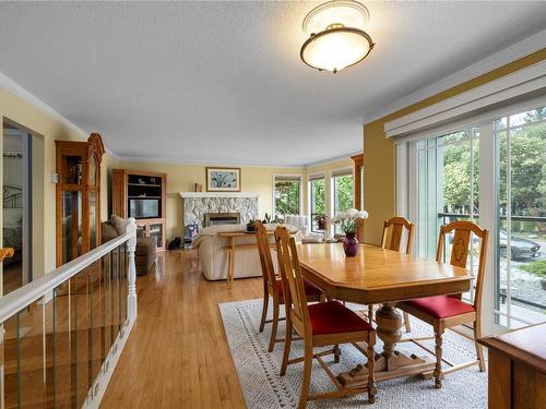 6217 Icarus Dr, Nanaimo, BC - Indoor Photo Showing Dining Room With Fireplace