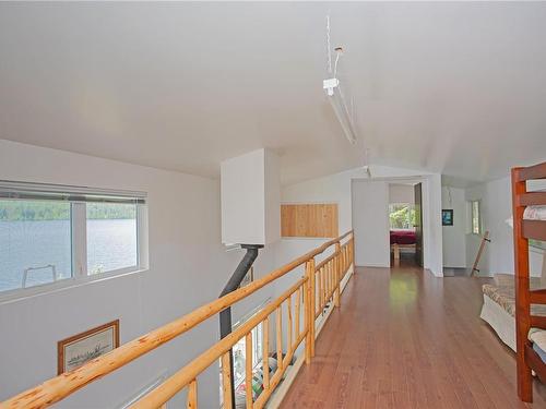 3400 Horne Lake Caves Rd, Qualicum Beach, BC - Indoor Photo Showing Other Room With Fireplace