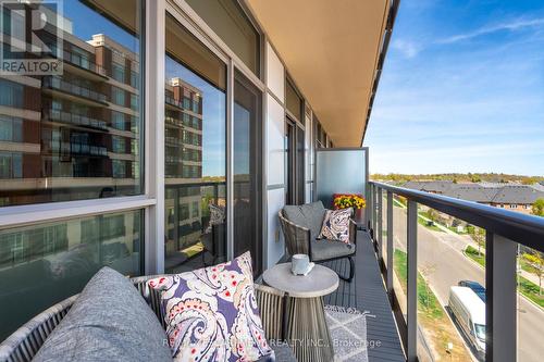 404 - 1940 Ironstone Drive, Burlington, ON - Outdoor With Balcony With Exterior