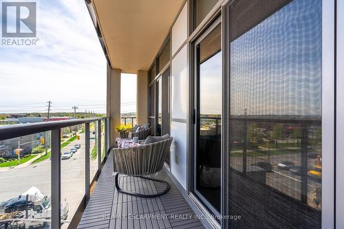 404 - 1940 Ironstone Drive, Burlington, ON - Outdoor With Balcony With Exterior