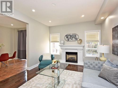 Upper - 52 Jordensen Drive, Brampton, ON - Indoor Photo Showing Living Room With Fireplace