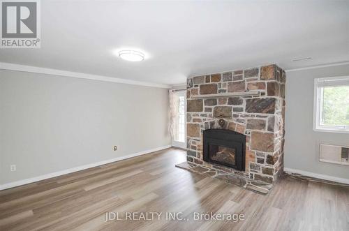 2614 Head Road, Scugog, ON - Indoor Photo Showing Living Room With Fireplace