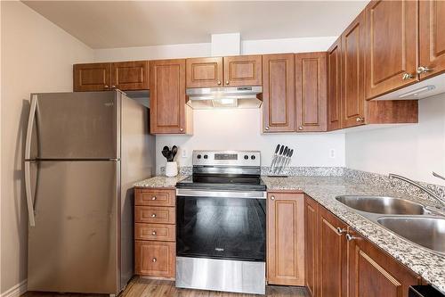 135 James Street S|Unit #408, Hamilton, ON - Indoor Photo Showing Kitchen With Double Sink