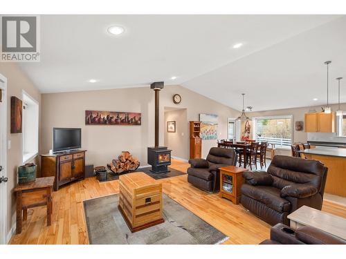 6594 Foothills Road, 100 Mile House, BC - Indoor Photo Showing Living Room With Fireplace