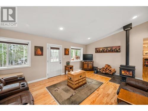 6594 Foothills Road, 100 Mile House, BC - Indoor Photo Showing Living Room With Fireplace