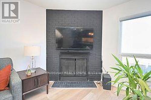 4659 Full Moon Circle, Mississauga, ON - Indoor Photo Showing Living Room With Fireplace