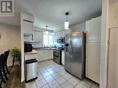 48 - 3050 Constitution Boulevard, Mississauga, ON - Indoor Photo Showing Kitchen With Double Sink