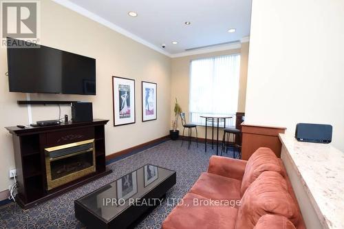 1004 - 1359 Rathburn Road, Mississauga (Rathwood), ON - Indoor With Fireplace