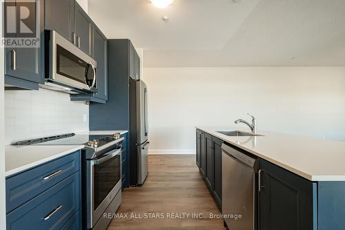 305 - 5917 Main Street, Whitchurch-Stouffville, ON - Indoor Photo Showing Kitchen With Upgraded Kitchen