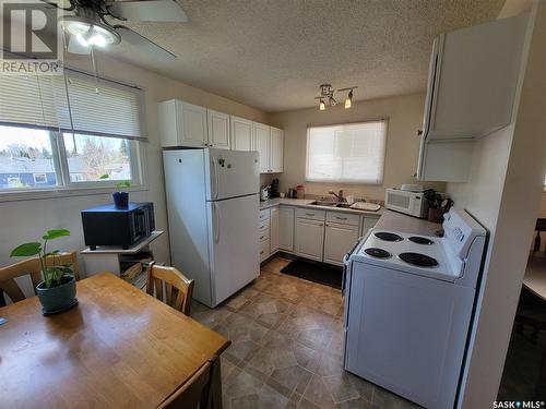 343 La Ronge Road, Saskatoon, SK - Indoor Photo Showing Kitchen With Double Sink