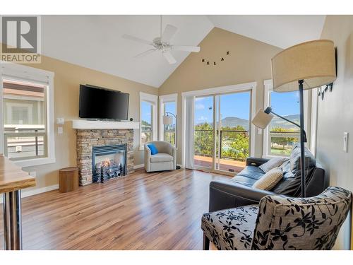 6816 Madrid Way Unit# 307, Kelowna, BC - Indoor Photo Showing Living Room With Fireplace
