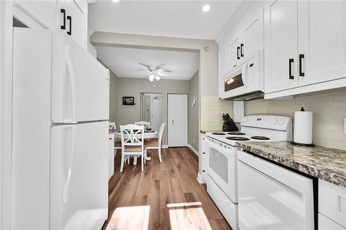 Granite countertops - 1253 Main Street W|Unit #6, Hamilton, ON - Indoor Photo Showing Kitchen