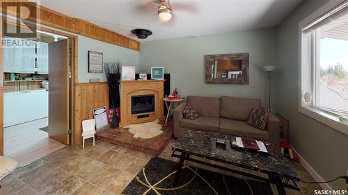 72 Canary Drive, Glen Harbour, SK - Indoor Photo Showing Living Room With Fireplace