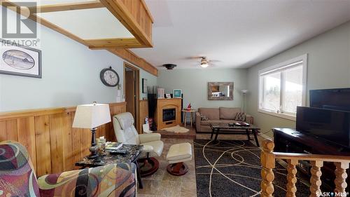 72 Canary Drive, Glen Harbour, SK - Indoor With Fireplace