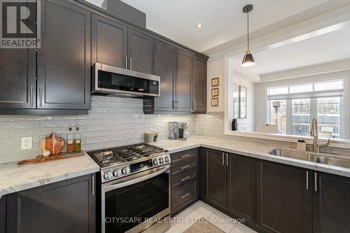 140 Robertson Road E, Hamilton, ON - Indoor Photo Showing Kitchen With Double Sink With Upgraded Kitchen