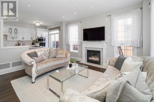 46 Millhouse Mews, Brampton, ON - Indoor Photo Showing Living Room With Fireplace